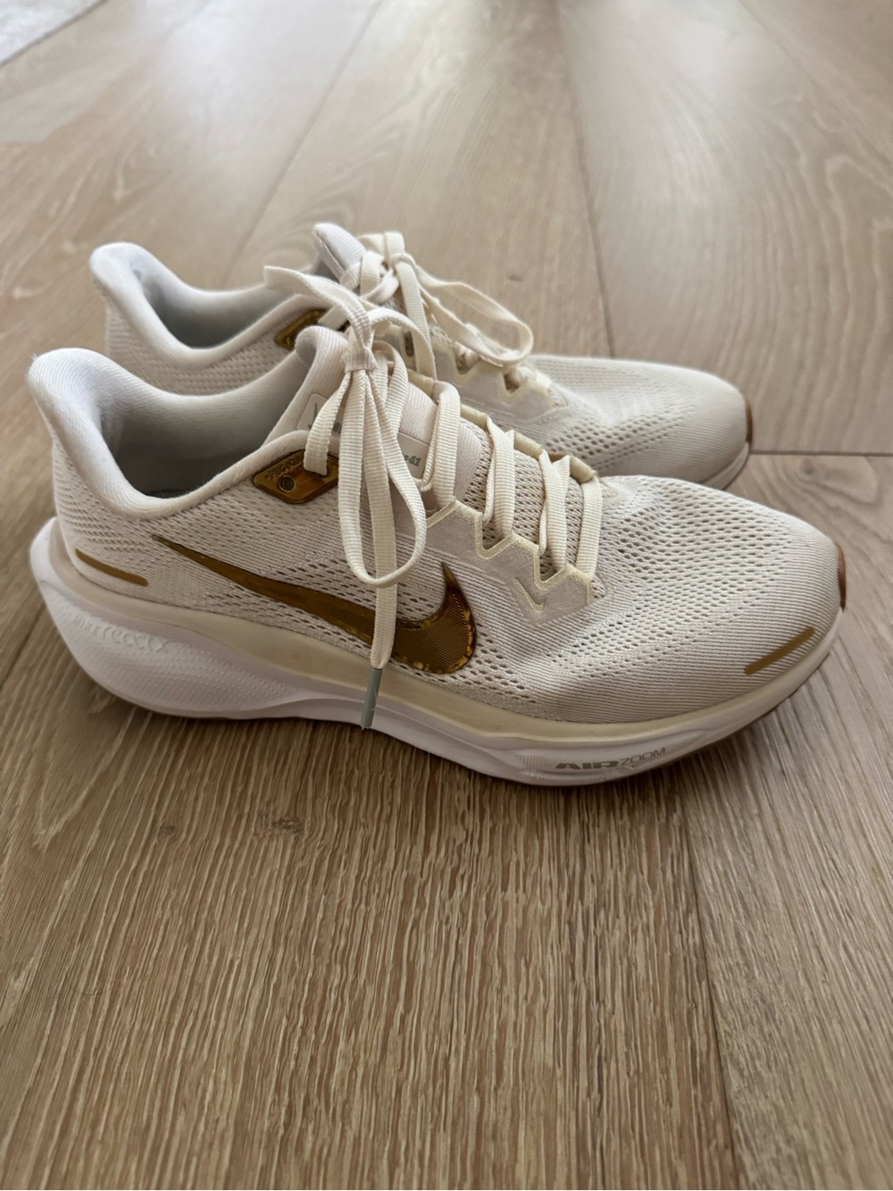 Women’s 7.5 Nike Pegasus Running Shoes - Cream with Gold Swoosh